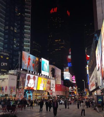 Times Square bustling with energy, showcasing marketing strategies in action