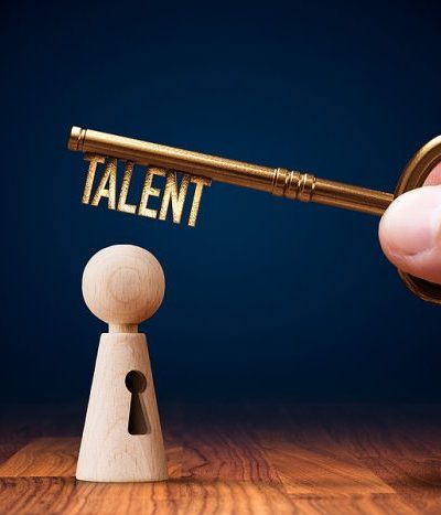 Business professionals discussing talent retention strategies amid the pandemic