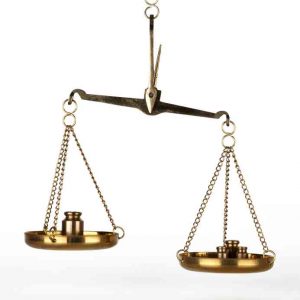 scales depicting the integration of work and personal life, emphasizing the importance of relationships and prioritization for achieving life balance.