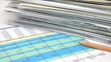 Illustration depicting the shift from spreadsheet dependence to maximizing ERP system capabilities in business decision-making