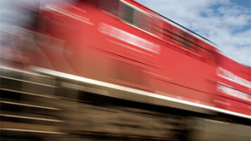 High speed freight train illustrating acceleration of supply chain innovation through advanced processes and technologies for enhanced performance